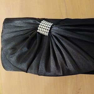 New, Never used Black silk Hand Clutch/purse bag by Gunne Sax